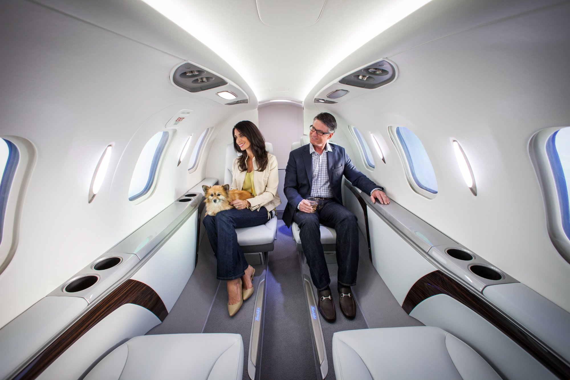 Talent couple in HondaJet cabin